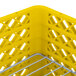 A yellow plastic Vollrath Traex Plate Crate with metal wire.