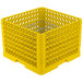 A yellow plastic Vollrath Traex plate rack with holes and blue handles.
