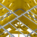 A yellow and grey plastic Vollrath Traex plate rack.