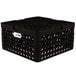 A black plastic Vollrath Traex Plate Crate with 12 compartments for plates.