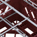 A close-up of a red and white Vollrath Plate Crate.