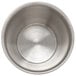 A close-up of a Carlisle stainless steel round sauce cup.