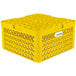 A yellow Vollrath Traex Plate Crate with compartments for plates.