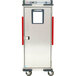 A silver rectangular Metro holding cabinet door with a window and red handles.