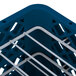 A blue plastic Vollrath Traex Plate Crate with white metal rods.