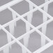 A white plastic grid with holes.