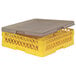 A yellow and grey Vollrath Traex plastic rack cover.