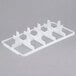 A white plastic Vollrath glass rack divider with 10 compartments.