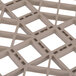 A white plastic grid cover with squares.