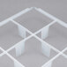 A white plastic grid with nine compartments.