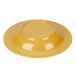A yellow bowl with a white interior.