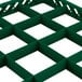 A green plastic Vollrath Traex grid with 16 compartments.