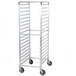 A white metal Regency sheet pan rack with wheels.