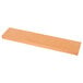 A rectangular orange Victorinox sharpening stone on a white background.