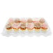 A clear plastic InnoPak cupcake container holding cupcakes.