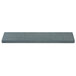 A grey rectangular Victorinox Crystolon sharpening stone.