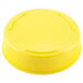 A Tablecraft yellow plastic cap for squeeze bottles with a 53 mm opening.