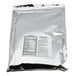 A silver bag of Malted Milk Powder with a label.