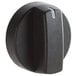 A black plastic Avantco temperature control knob with a white stripe and a small hole in it.