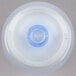 A close up of a white plastic squeeze bottle with a blue circle on the lid.