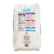 A close up of a Gulf Pacific White Long Grain Rice bag with red and blue labels.