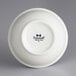 A white Tuxton china nappie bowl with black text.