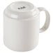 A close-up of a white CAC china mug with a handle.