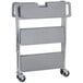 A gray Carlisle folding utility cart with three shelves on wheels.