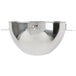 A close-up of a silver KitchenAid mixing bowl with a handle.