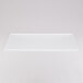 An Eastern Tabletop rectangular acrylic buffet shelf on a white surface