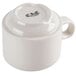 A close up of a CAC Ivory stackable china cup with a handle.