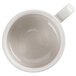 A CAC ivory china mug with a handle.