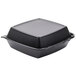 A black foam square container with a perforated hinged lid.