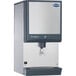 A Follett countertop ice machine and dispenser with a stainless steel top.