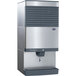A stainless steel Follett countertop ice maker and dispenser.