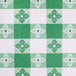 A green and white checkered Intedge vinyl table cover.