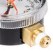 A Bunn water quality system pressure gauge with a white and gold cap.