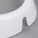 A close up of a white Tablecraft salad dressing dispenser collar.