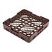 A brown plastic full size base rack with closed sides and an open grid bottom, designed for dishwashing and storage.