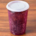 A translucent plastic lid on a Dinex tumbler.