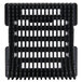 A black plastic pusher insert with holes in it.