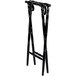 A black wooden Lancaster Table & Seating folding tray stand with turned legs.