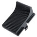 A black plastic Edlund pusher insert with small black spikes.
