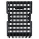 A black and white plastic pusher insert with a grid pattern.