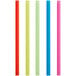 A group of colorful straws including green, blue, pink, and white.