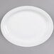 A Tuxton Colorado bright white china platter with a narrow rim.