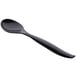 A black plastic spoon with a handle.