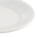 A close-up of a Homer Laughlin bright white oval china platter with a white rim.