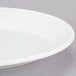 A close-up of a Homer Laughlin bright white oval china platter.