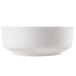A white bowl sitting on a table.
